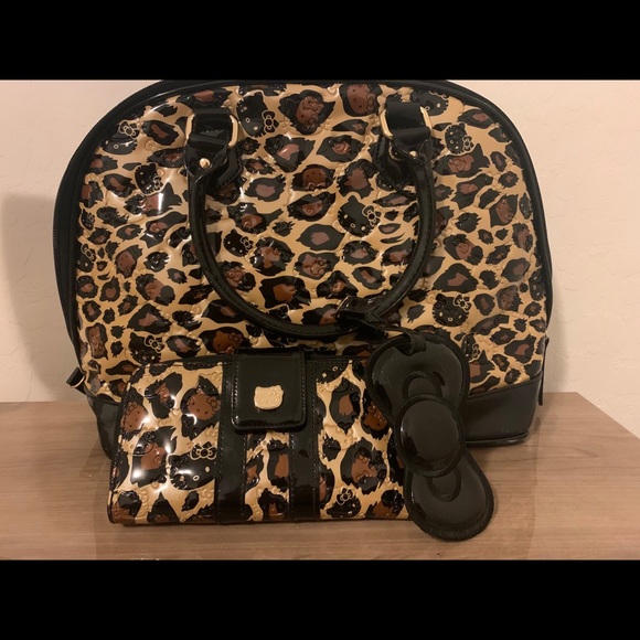 Hello Kitty Handbags - Hello Kitty leopard print purse & matching wallet